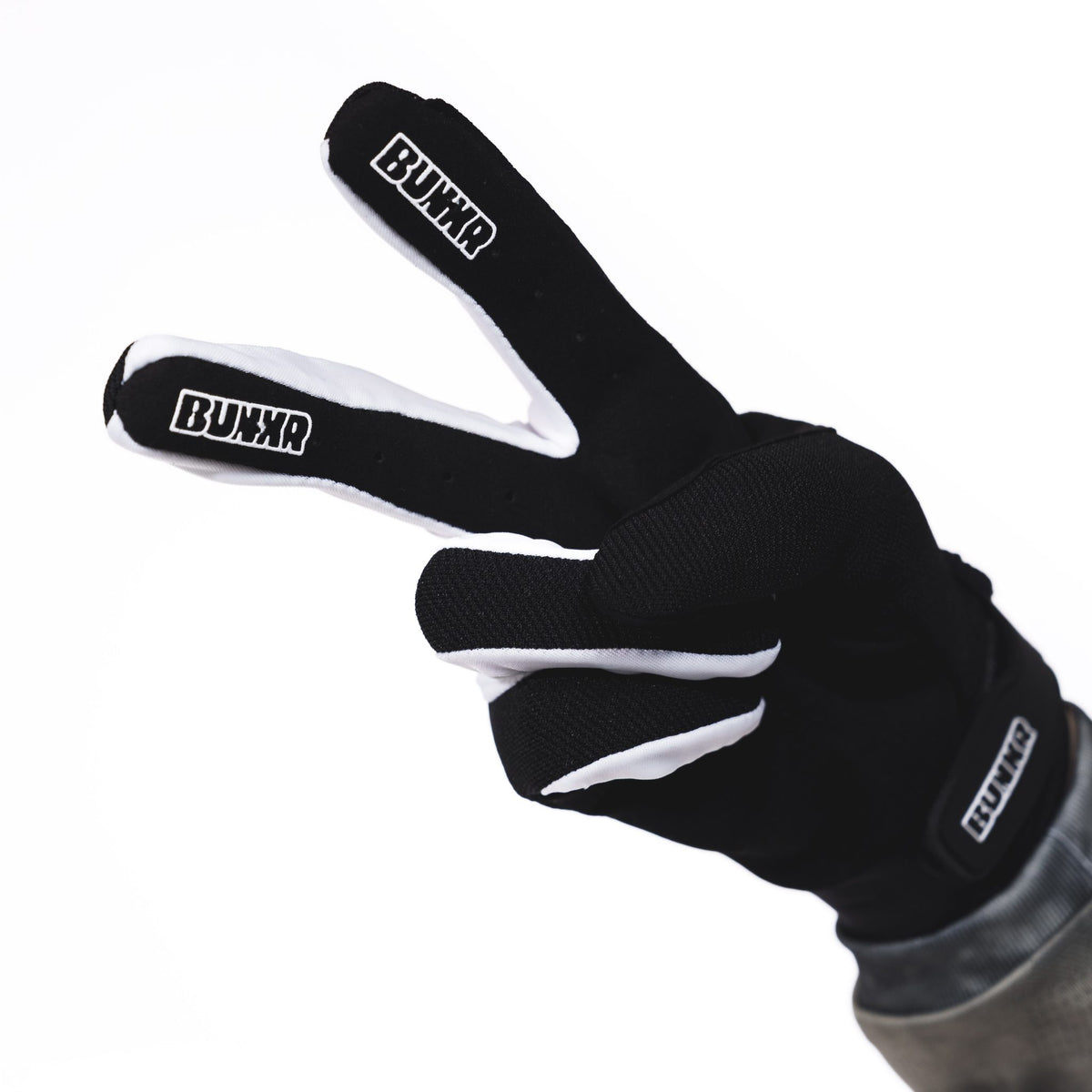BUNKR Gloves side view showing white finger panels and silicone fingertips